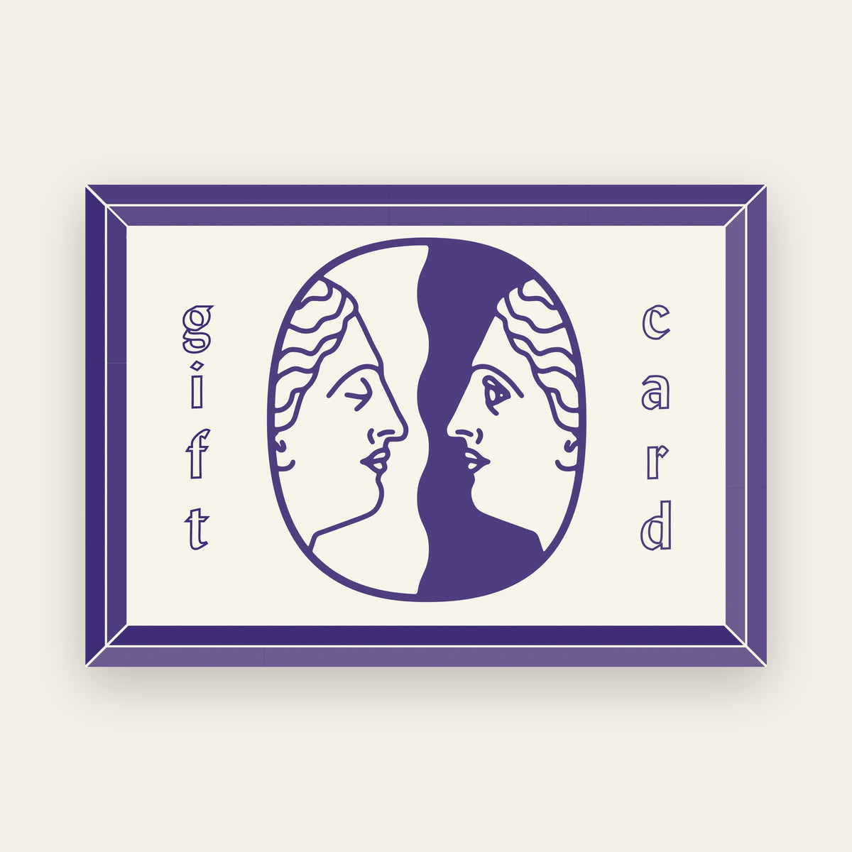Unseen Worlds gift card with the twin-face logo in purple on cream inside a purple frame