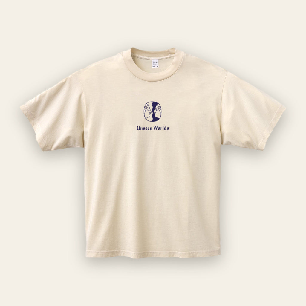 Unseen Worlds Logo Tee in creme Supima cotton with the twin-face logo printed in blue on the chest, front view