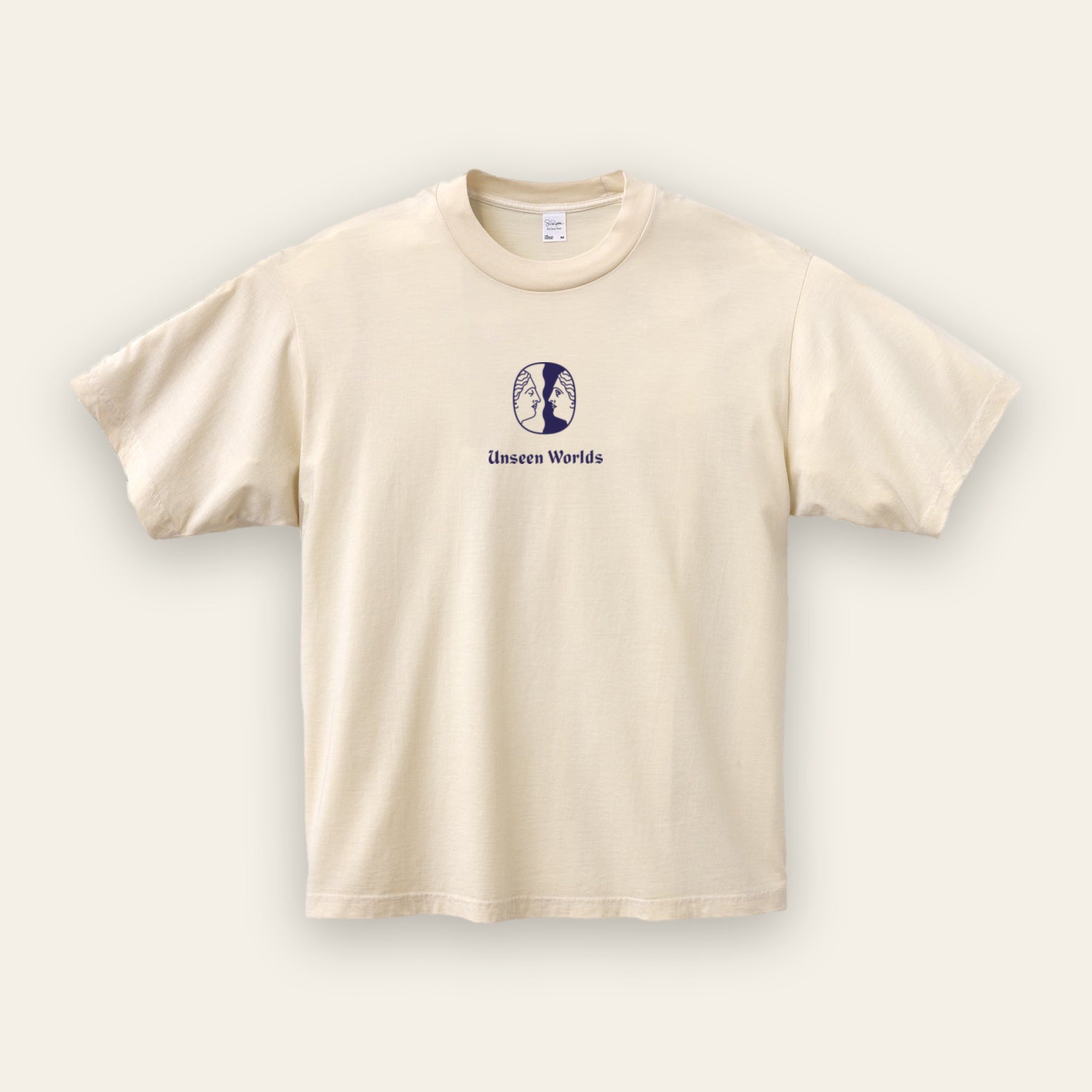 Unseen Worlds Logo Tee in creme Supima cotton with the twin-face logo printed in blue on the chest, front view